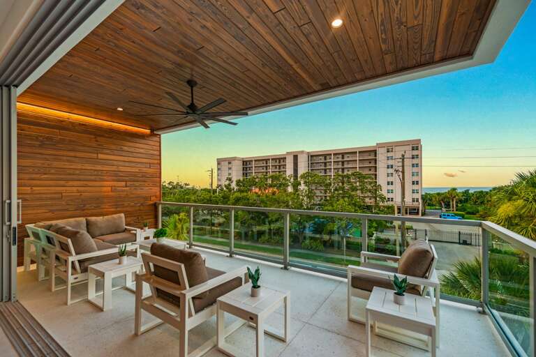 Twilight - 2nd Living Level - Balcony Access off Great Room - Seating - Gulf Views Twilight - 2nd Living Level - Balcony Access off Great Room - Seating - Gulf Views