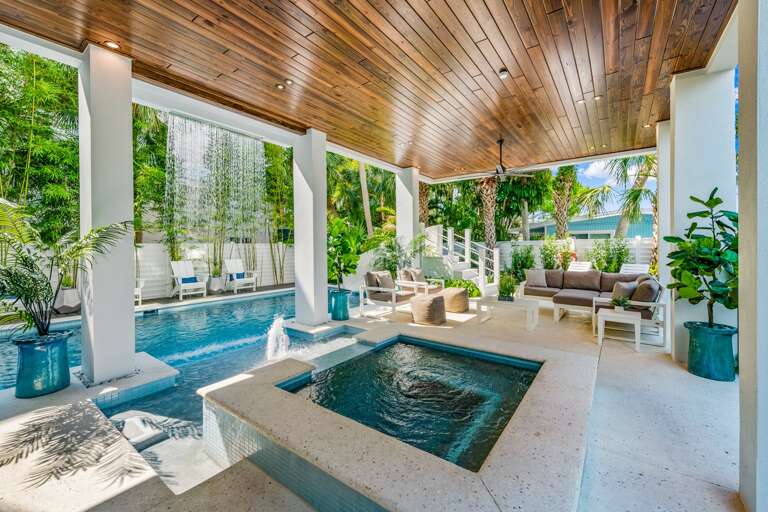 Covered Pool Area - Lounge Seating and Gas Grill Covered Pool Area - Lounge Seating and Gas Grill