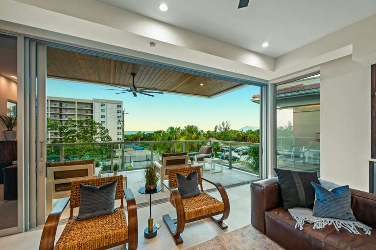 Twilight - 2nd Living Level - Balcony Access off Great Room - Seating - Gulf Views Twilight - 2nd Living Level - Balcony Access off Great Room - Seating - Gulf Views