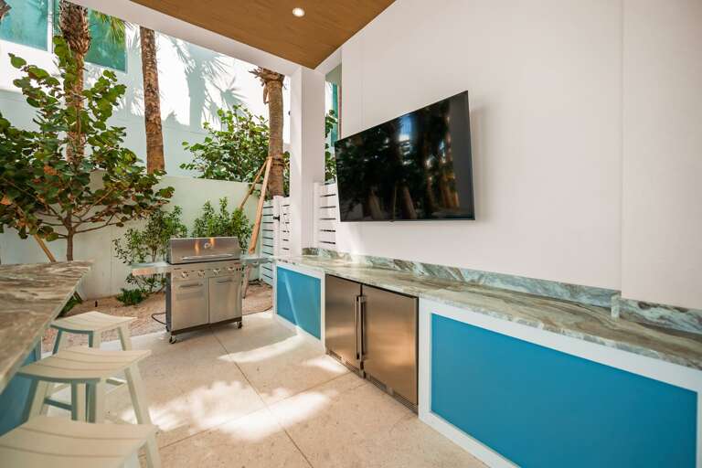 Covered Pool Area - Bar and Dining seating w/ Large HDTV