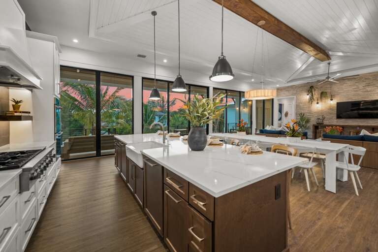 Great Room - Open Floor Plan - Fully Stocked Kitchen, Dining for 10 and Bar seating for 5 - Balcony Access - Lake Views.