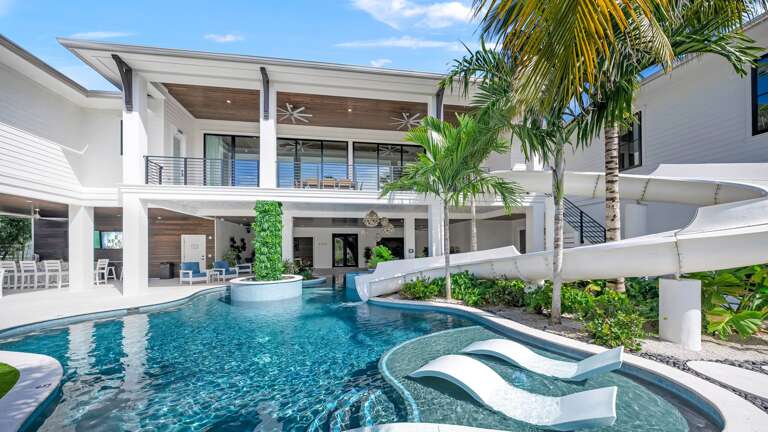 Rear Elevation - Waterslide - Sun Shelf - Resort Style Pool