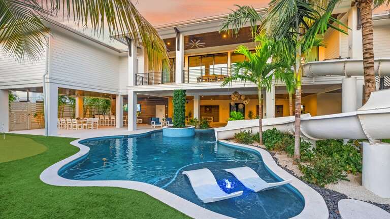 Twilight - Rear Elevation - Salty Oak - Water Slide - Resort Style Pool - Mini Golf & Golf Simulator.