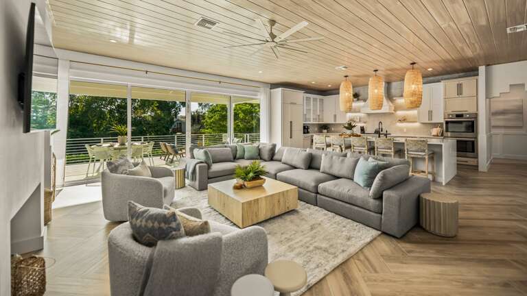 Great Room - Open Floor Plan - Fully Stocked Kitchen, Dining for 10 and Bar seating for 5 - Balcony Access - Lake Views