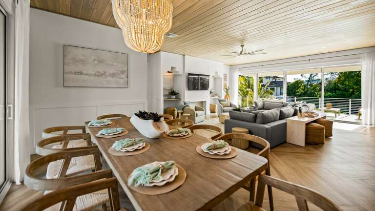 Great Room - Open Floor Plan - Fully Stocked Kitchen, Dining for 10 and Bar seating for 5 - Balcony Access - Lake Views