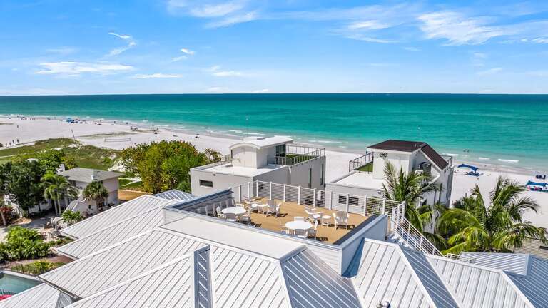 Daytime - Aerial Drone - Rooftop Deck - Gulf Views Daytime - Aerial Drone - Rooftop Deck - Gulf Views