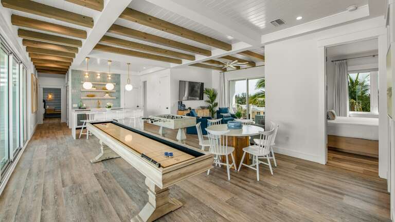 2nd Living Level - Club Room - Shuffleboard - Foosball - Wet Bar - Balcony Access - Gulf Views 2nd Living Level - Club Room - Shuffleboard - Foosball - Wet Bar - Balcony Access - Gulf Views