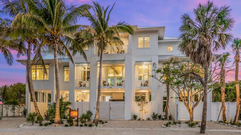 Twilight - Front Elevation - Sandbar Social - Sleeps 18 - Steps to the Beach Twilight - Front Elevation - Sandbar Social - Sleeps 18 - Steps to the Beach