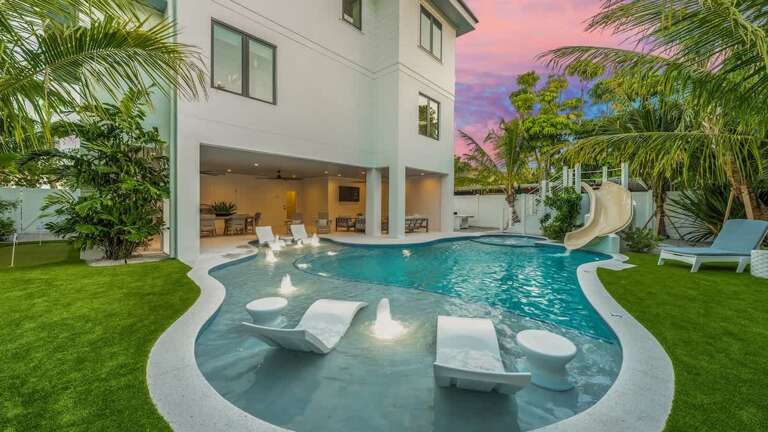 White Villa With Pool, Palms, Sunset Skies