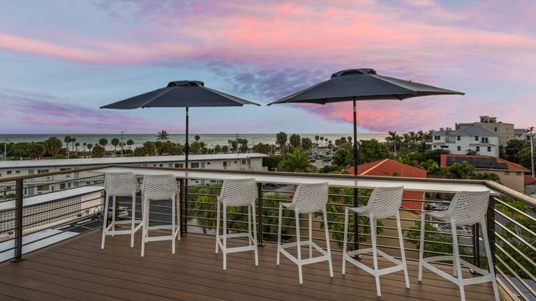 Twilight- Rooftop Deck - High-Top Bar Seating - Gulf Views Twilight- Rooftop Deck - High-Top Bar Seating - Gulf Views