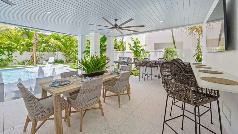 Daytime - Covered Pool Area - High Chairs - HD TV, BBQ Grill Daytime - Covered Pool Area - High Chairs - HD TV, BBQ Grill