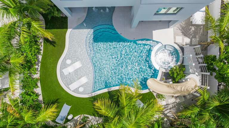 Daytime - Aerial - Resort Style Pool w/ Water Slide and Heated Spa Daytime - Aerial - Resort Style Pool w/ Water Slide and Heated Spa