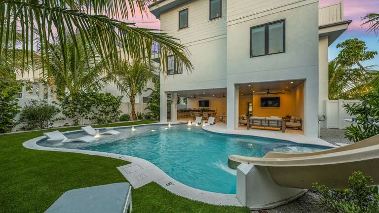 Twilight - Resort Style Pool w/ Water Slide and Heated Spa Twilight - Resort Style Pool w/ Water Slide and Heated Spa