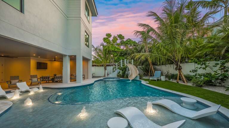 Twilight - Resort Style Pool w/ Water Slide and Heated Spa Twilight - Resort Style Pool w/ Water Slide and Heated Spa