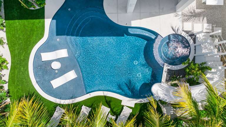Daytime - Aerial - Resort Style Pool w/ Water Slide and Heated Spa Daytime - Aerial - Resort Style Pool w/ Water Slide and Heated Spa