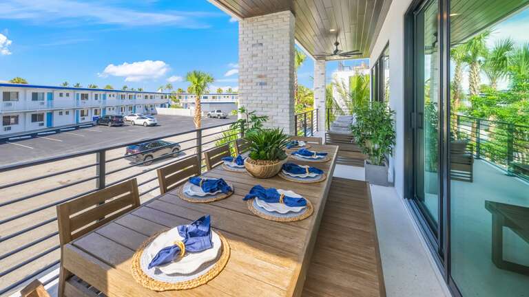 Daytime - 1st Living Level - Front Balcony - Living Room Access - Outdoor Dining Area