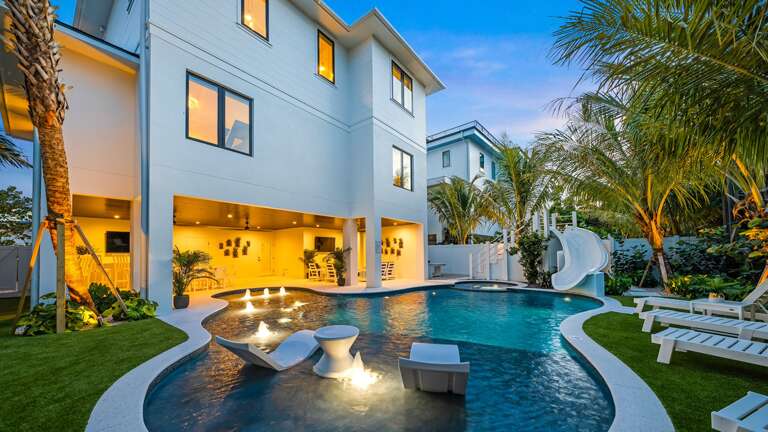 Twilight - Resort Style Pool - Tropical Landscaping - and Putt Putt Golf Twilight - Resort Style Pool - Tropical Landscaping - and Putt Putt Golf