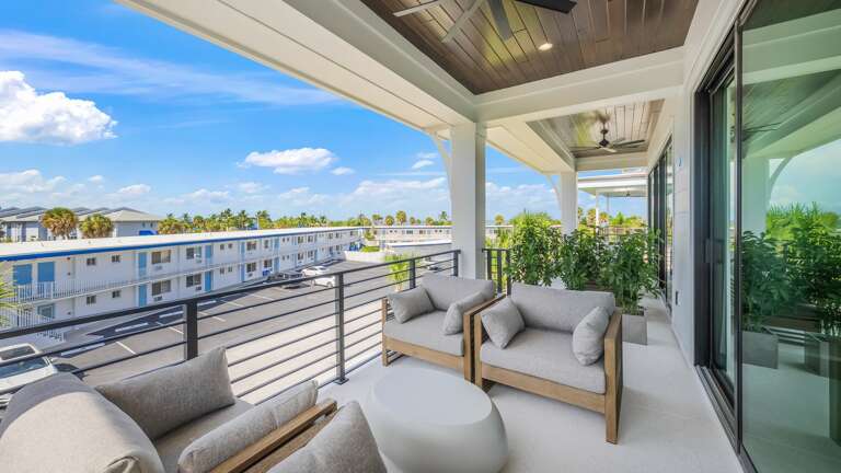 Daytime - 2nd Living Level - Master Bedroom - Balcony Access w/ a View! Daytime - 2nd Living Level - Master Bedroom - Balcony Access w/ a View!