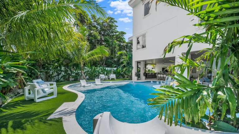 Resort Style Pool w/ Water Slide and Heated Spa