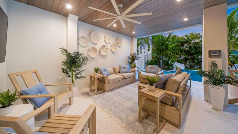 Twilight - Covered Pool Area - Outdoor Lounge Area - Soft Seating - Large HDTV