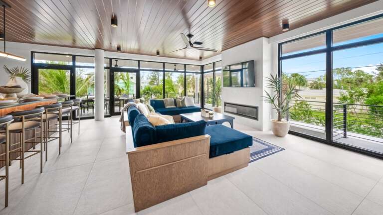 Great Room - Open Floor Plan - Fully Stocked Kitchen, Dining for 10 and Bar seating for 5 - Balcony Access - Lake Views