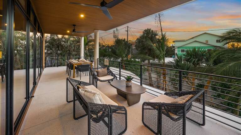 Twilight - 1st Living Level - Rear Balcony - DIning and Lounge Space