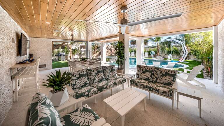Covered Pool Area - Lounge Area - Outdoor Dining Table - Large HDTV