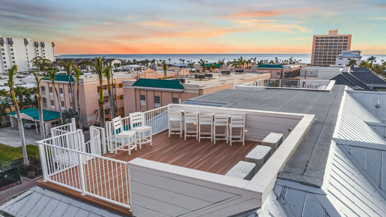Rooftop Deck, Sunset Sky, Palm-lined View