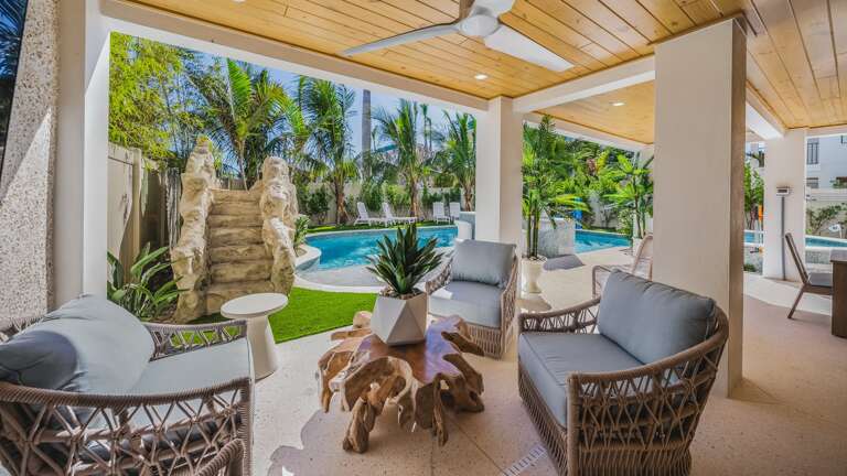Covered Pool Area - Lounge Area - Outdoor Dining Table - Large HDTV