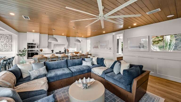 Vacation Rentals Vast Living Area With Vaulted Ceiling, Large Sectional Sofa, And Integrated Kitchen