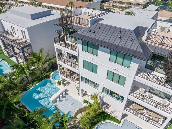 Aerial Drone - Resort Style Pool w/ Water slide, spa, and Pool Volleyball Aerial Drone - Resort Style Pool w/ Water slide, spa, and Pool Volleyball