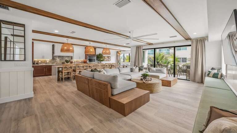 Spacious Living Space Seamlessly Spans To Scenic Sliding Doors