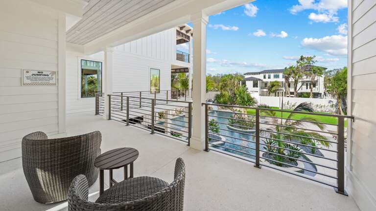 Bedroom 2 - King Sized Bed w/ En-Suite Bathroom and Balcony Access