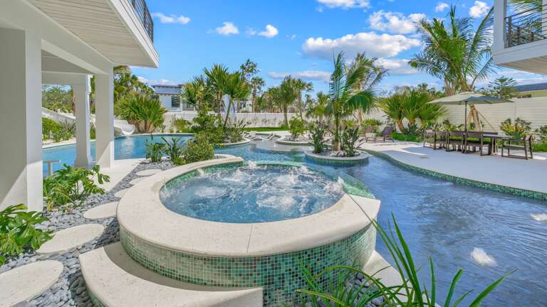 Resort Style Pool w/ Waterslide - Oversized Spa - Beach Entry - Lounge Seating