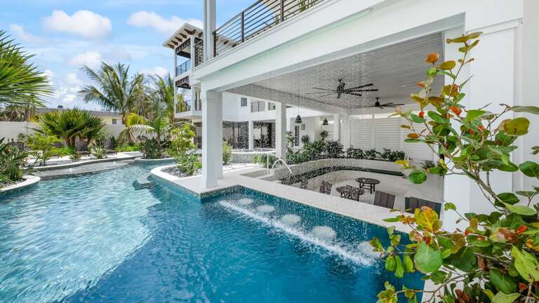 Swim up Bar w/ Rain Curtain - Sunken Living Room - 3 Large HDTV's