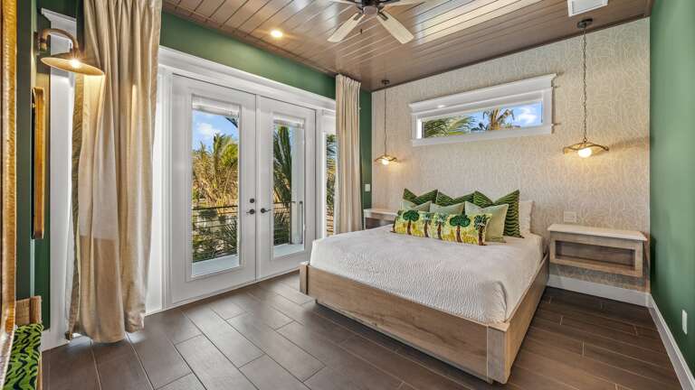 Bedroom 2 - King Sized Bed w/ En-Suite Bathroom and Balcony Access