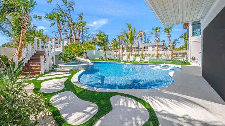 Covered Pool Area - Resort Style Pool w/ Waterslide and Oversized Spa - Sport Court & Mini Golf