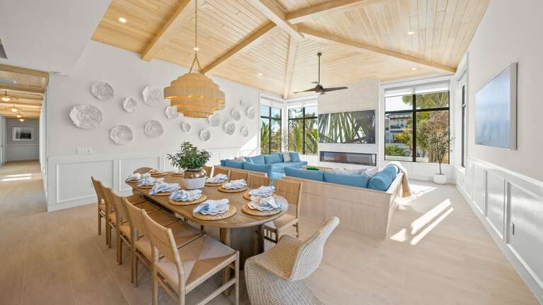 Great Room - Open Floor Plan - Fully Stocked Kitchen, Dining for 16 and Bar seating for 6 - Balcony Access