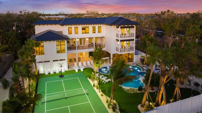 Twilight - Rear Elevation - Resort Style Pool w/ Waterslide and Oversized Spa - Mini Golf, Pickleball, Hockey, Basketball and Ping Pong