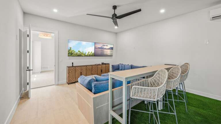 Media Centre - Features 2-Large HDTV's Soft Seating, Bartop Seating and Sports Simulator