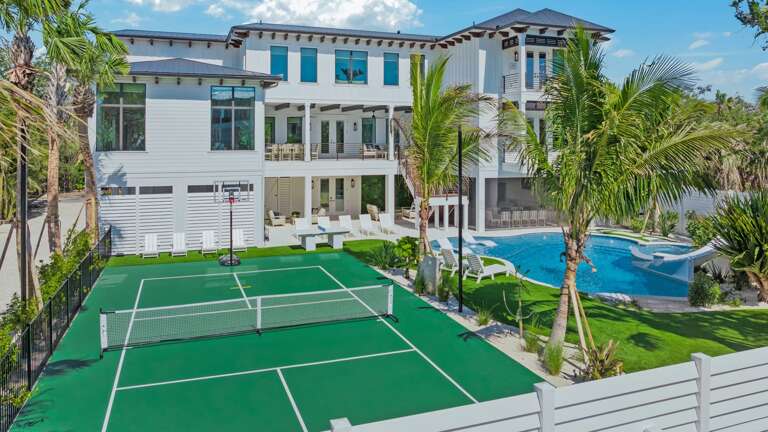 Rear Elevation - Covered Pool Area - Resort Style Pool w/ Waterslide and Oversized Spa - Sport Court & Mini Golf