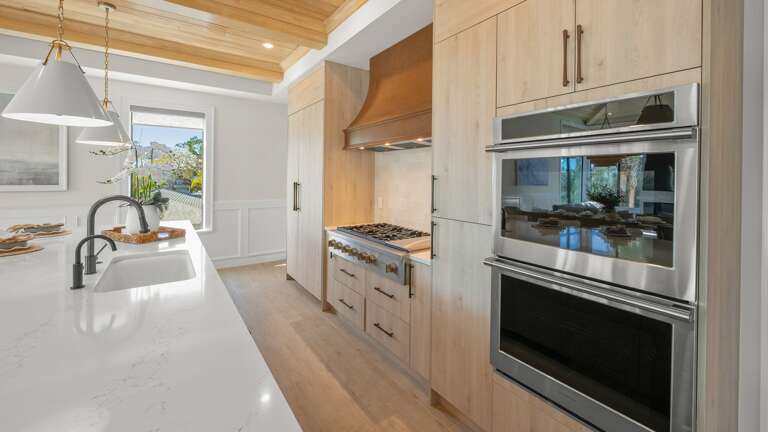 Kitchen - Oversized Refrigerator - (2) Dishwashers, Double Ovens, & Large Gas Stove - Balcony Access