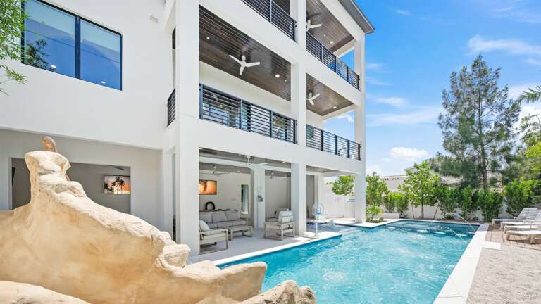 Resort Style Pool & Spa - Waterslide - Waterfall Grado - Lounge Chairs