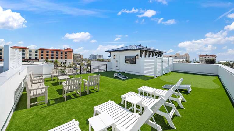 Daytime - Rooftop Access - Lounge Chairs - Corn Hole - Mini Golf