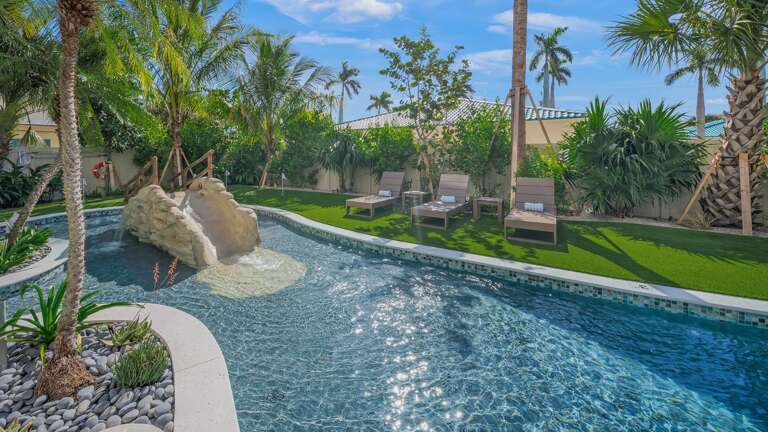 Pool Area - Kid Water Slide - Lounge Chairs