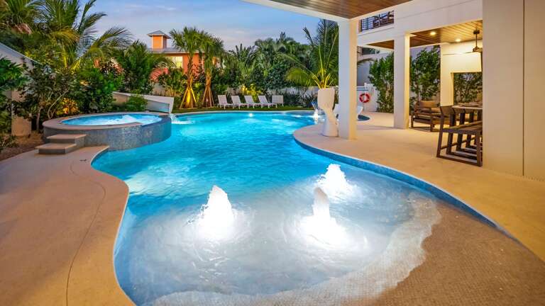 Beach Entry to this Resort Saltwater Pool with 2nd Story Waterslide