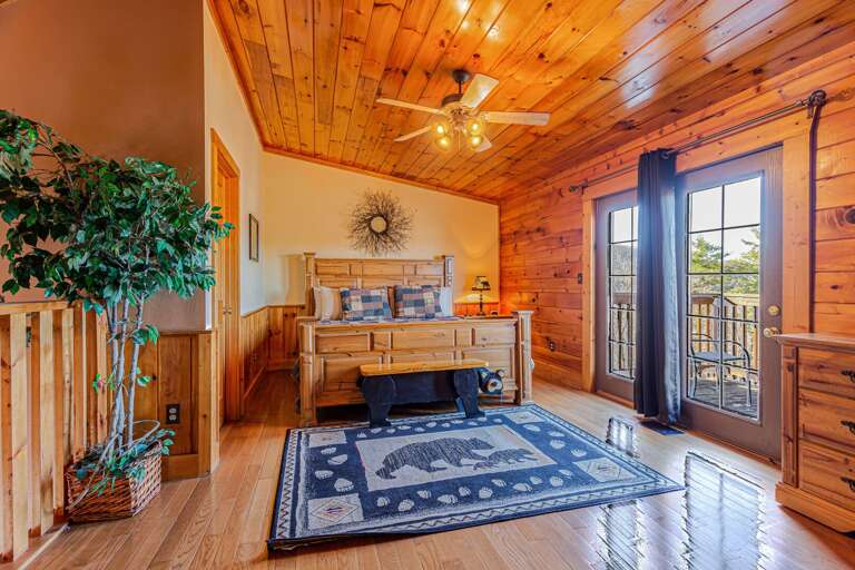 The Upstairs Bedroom has balcony access to the great views of the Smoky Mountains.
