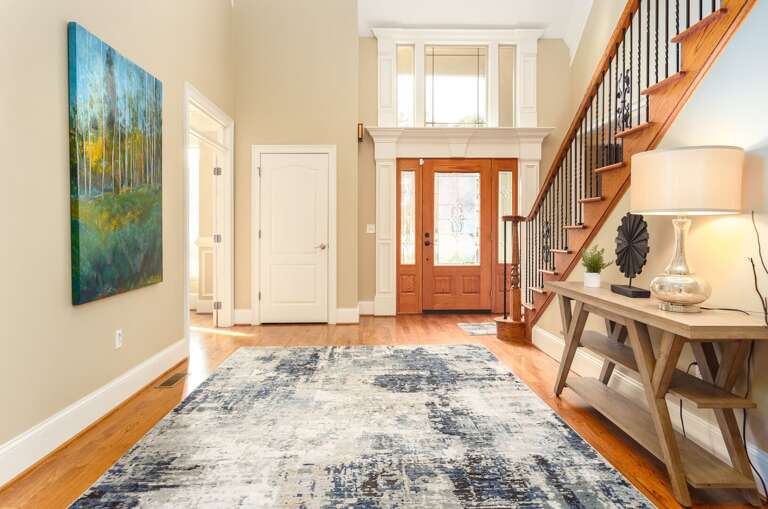 2 bedrooms on the main floor provide flexibility for those who prefer to avoid using stairs to get to their bedroom. Upstairs contains 3 bedrooms.