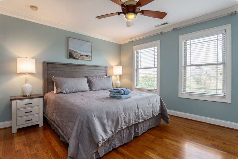 Ceiling fans will keep your bedroom air extra circulated and provide added relaxation for those who love a subtle white noise.
