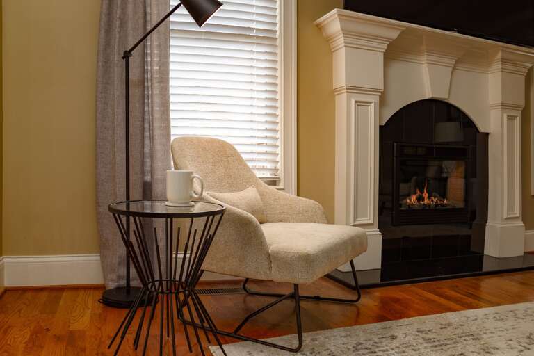 Cozy up with a book and a hot cup of tea or coffee next to the gas fireplace in the Living Room.